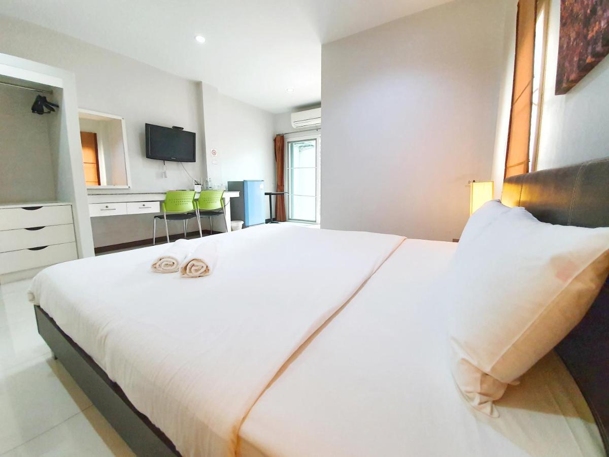 Orchid Surin Apartment Exterior photo