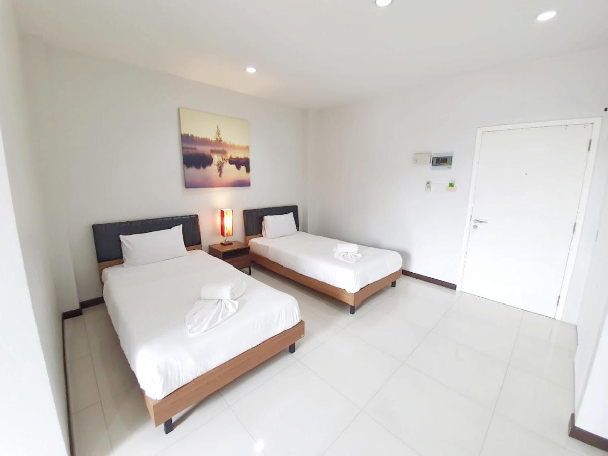 Orchid Surin Apartment Exterior photo